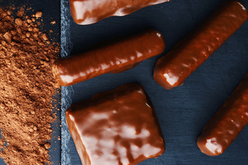 Close-up of chocolate sweets on a dark background.