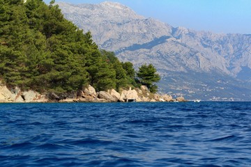 Fototapeta premium Beautiful view of the Adriatic Sea in Croatia in southern Dalmatia with mountains in the background