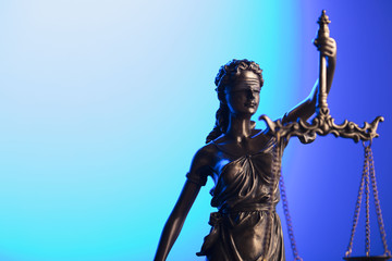 Fototapeta premium Gavel and themis on blue background.