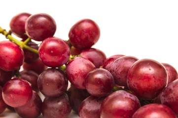 Fresh red grapes isolated on white background