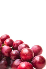 Fresh red grapes isolated on white background