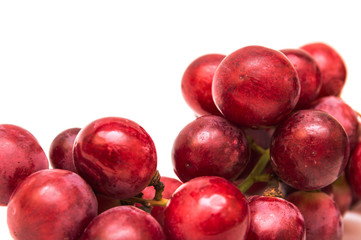 Fresh red grapes isolated on white background