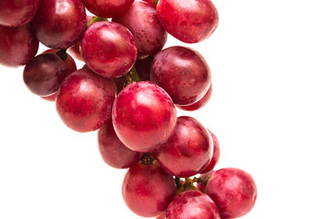 Fresh red grapes isolated on white background