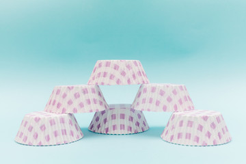 Cardboard cupcakes boxes on retro colour background