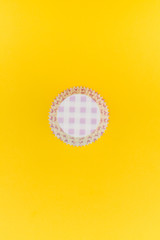 Cardboard cupcakes boxes on retro colour background