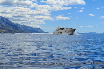 A beautiful view of the Adriatic Sea and a motorboat in Croatia, Southern Dalmatia 