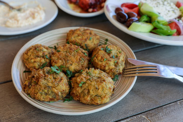 Fried zucchini balls plate in the greek tavern.