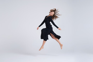 Young attractive woman hovering in the air