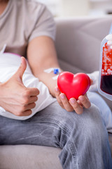 Patient getting blood transfusion in hospital clinic