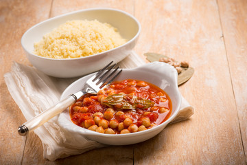 couscous and chickpeas with tomato sauce, selective focus