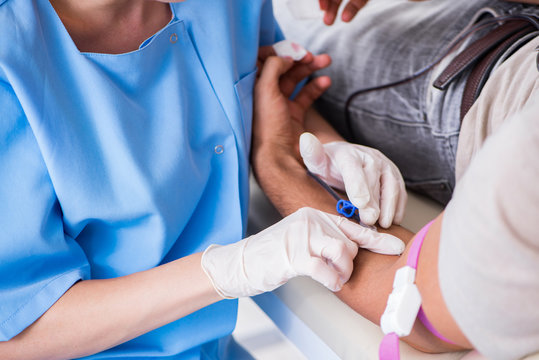 Patient getting blood transfusion in hospital clinic