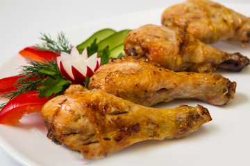 chicken legs on the grill