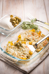 lasagne with  capsicum mozzarella and green olives, selective focus