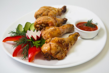 chicken legs on the grill