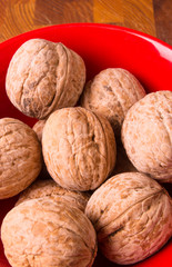 walnuts in red plate