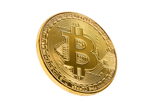 Golden bitcoin isolated on a white background. Selective focus. Cryptocurrency concept.