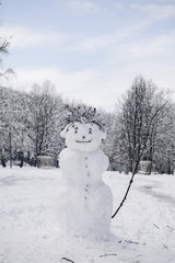 Fototapeta premium Funny snowman in the park.