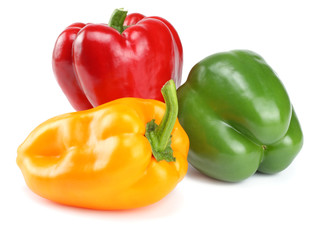 green, red, yellow sweet bell peppers isolated on white background