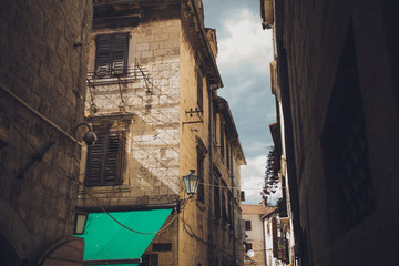 Fototapeta na wymiar Old narrow street in Kotor.