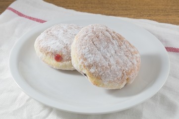 Plate of Fresh Donut Filled with Strawberry Jam