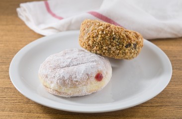 Strawberry Jam Filled Donut and Peanuts Chocolate Donut