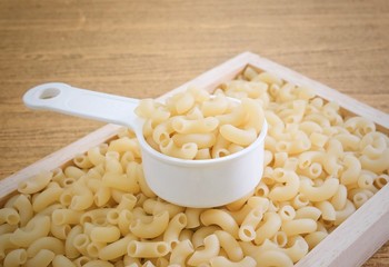 Elbow Macaroni or Gomiti Pasta in Measuring Cup