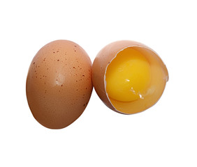 One whole and a broken chicken egg on white. Chicken egg with clipping path
