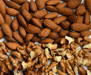 A lot of chopped walnuts and almonds. Background from the nuts.