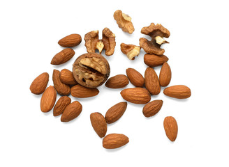 Chopped walnuts and whole almonds isolated on white background. Several kinds of nuts
