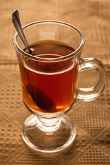 Cozy black tea cup on table