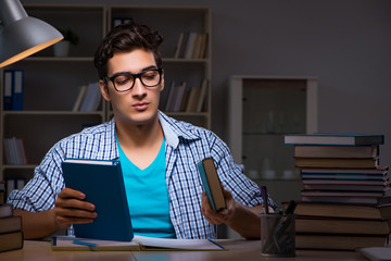 Student preparing for exams late night at home