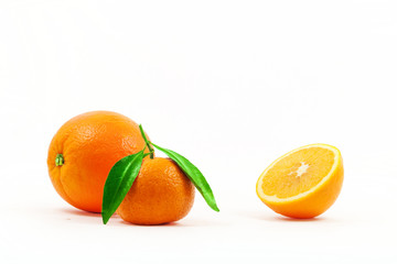 tangerine, mandarins with leaves and half orange