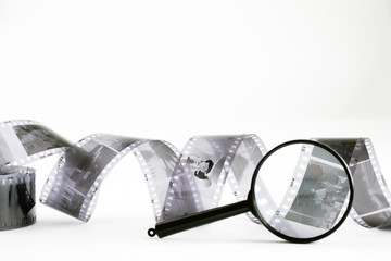 black-and-white negative film and magnifier  