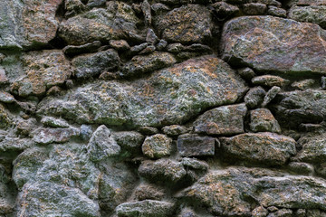 Stone wall of an abandoned castle