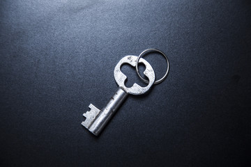 key on dark table