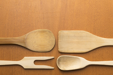 wooden kitchen utensils placed on table