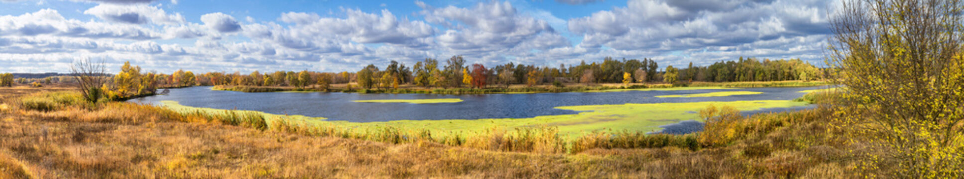 Autumn  landscape banner, panorama - river valley of the Siverskyi (Seversky) Donets, the winding river over the meadows between hills and forests, the northeast of Ukraine