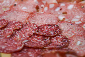 Food tray with delicious salami. Meal platter with selection