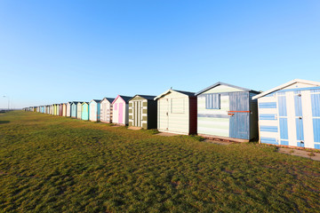 Fototapeta na wymiar beach huts at harwich and dovercourt, uk