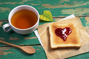 Toasted bread with jam and tea
