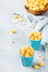 Sweet caramel popcorn for party or cinema at home