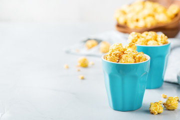Sweet caramel popcorn for party or cinema at home