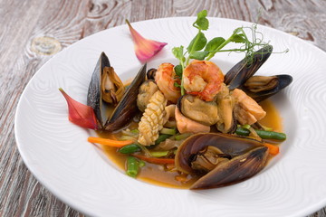 Seafood salad on a white plate