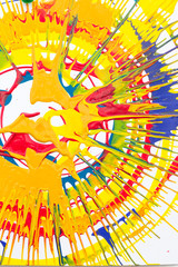 art supplies, background, creativity concept. close up of one big smudge that made with gouache paints of different coloures such as light and dark yellow, red, blue and some green