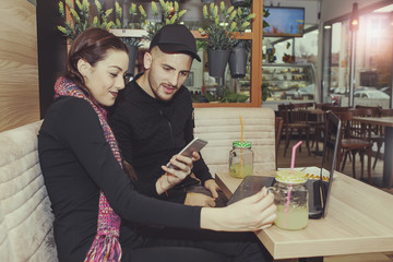 Couple using smartphone