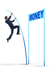 Businessman jumping over money in business concept