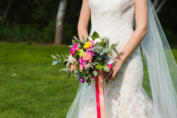 Wedding bouquet in bride hands