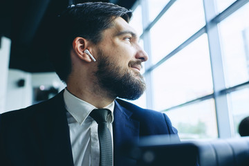 man with wireless earpiece