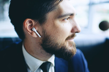 man with wireless earpiece
