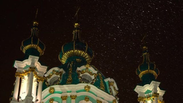 Snowfall Snowflake Christmas with Ortodoxal Saint Andrew's Church Green Domes on Background